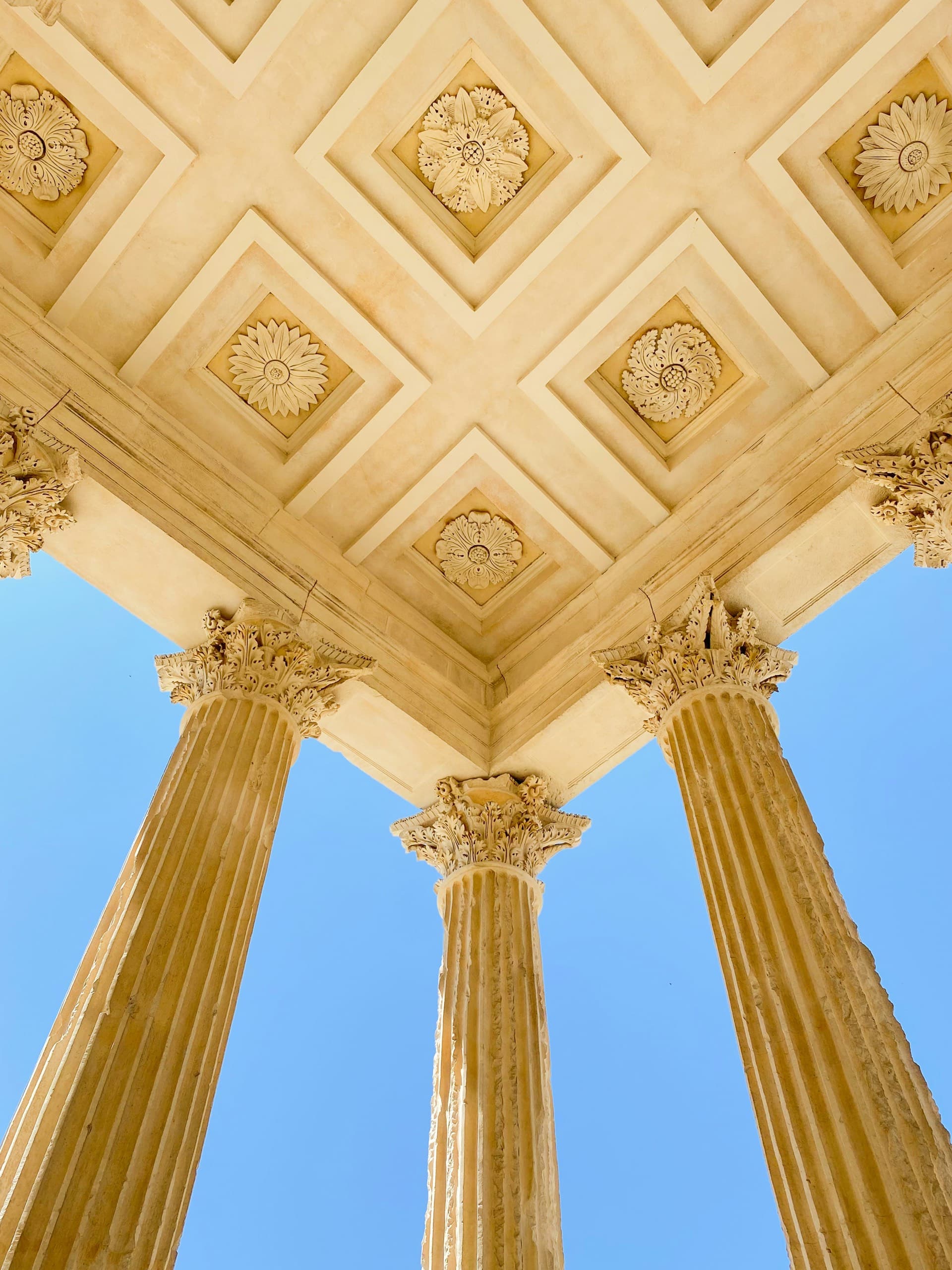 Ornate temple ceiling with Corinthian columns